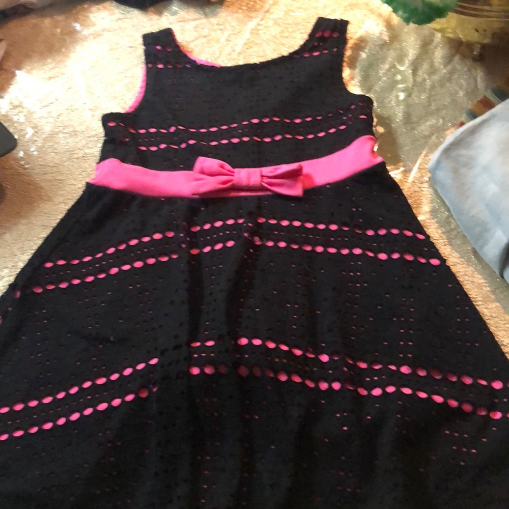 Black dress with pink.